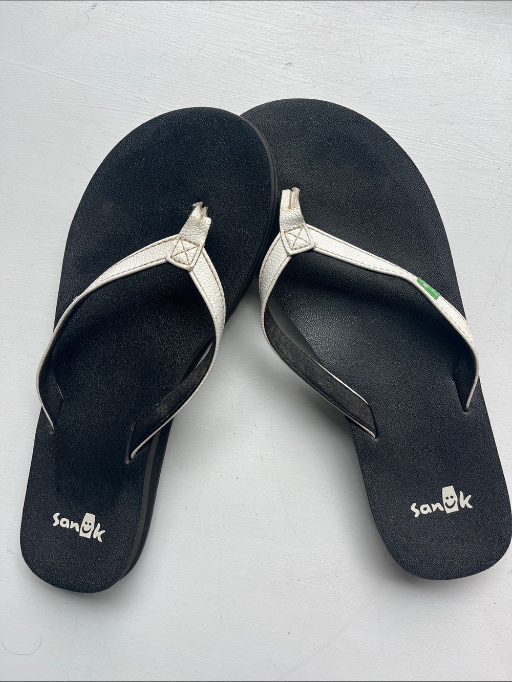Sanuk Women’s Black Flip Flop Sandals with White Straps